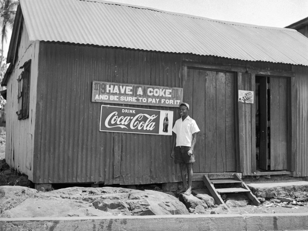 A store in Monrovia, Liberia, advertises Coca-Cola. The photo is from circa 1947.