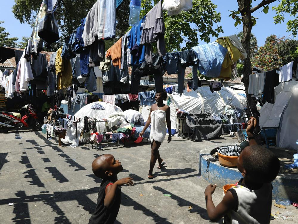Children play in the courtyard of a shelter for families displaced by gang violence, in Port-au-Prince on Thursday.