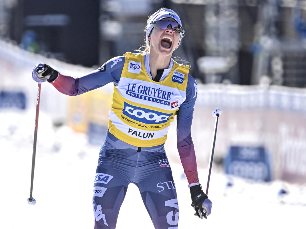 Jessie Diggins celebrates winning the Women's 20 km Mass Start FIS World Cup skiing competition in Falun, Sweden, on Sunday.