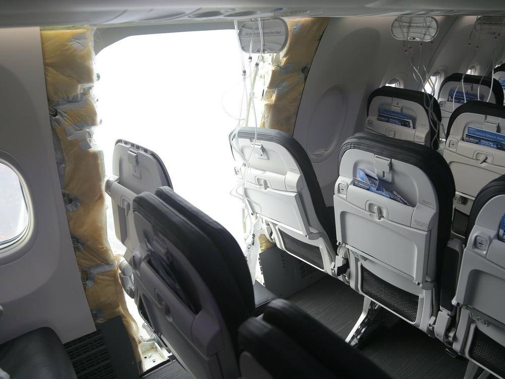An image from the NTSB investigation shows the interior of Alaska Airlines Flight 1282 on a Boeing 737 Max 9, which suffered a violent explosion when the aircraft lost a door plug during a commercial flight.