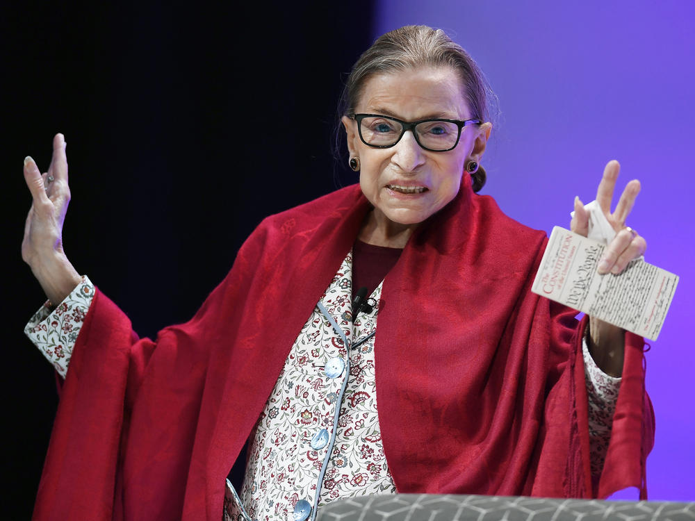 Supreme Court Justice Ruth Bader Ginsburg gestures to students before she speaks at Amherst College in Amherst, Mass, on Oct. 3, 2019.