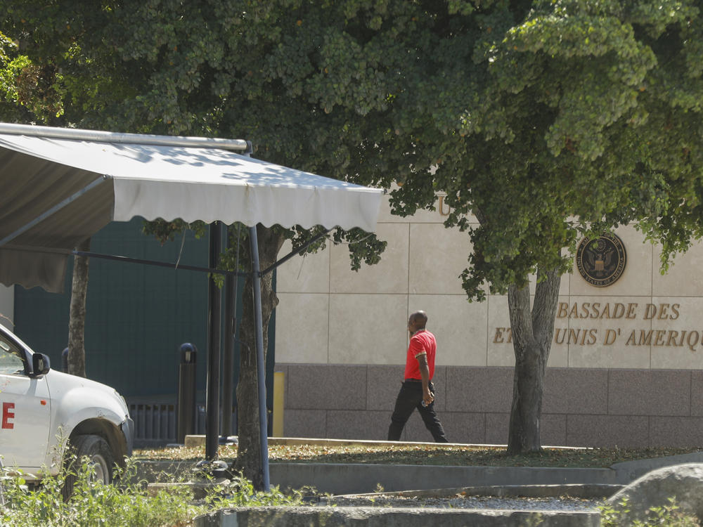 A man enters the U.S. embassy in Port-au-Prince, Haiti, Sunday, March 10, 2024.