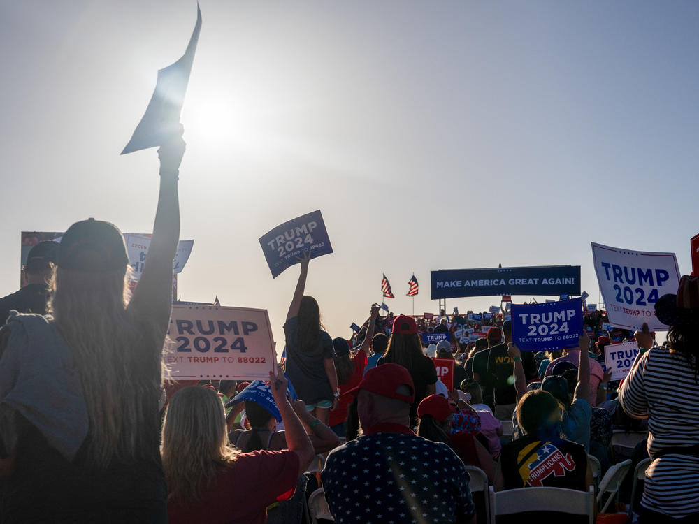 Supporters cheer as former President Donald Trump speaks at the Waco Regional Airport last spring in Waco, Texas.