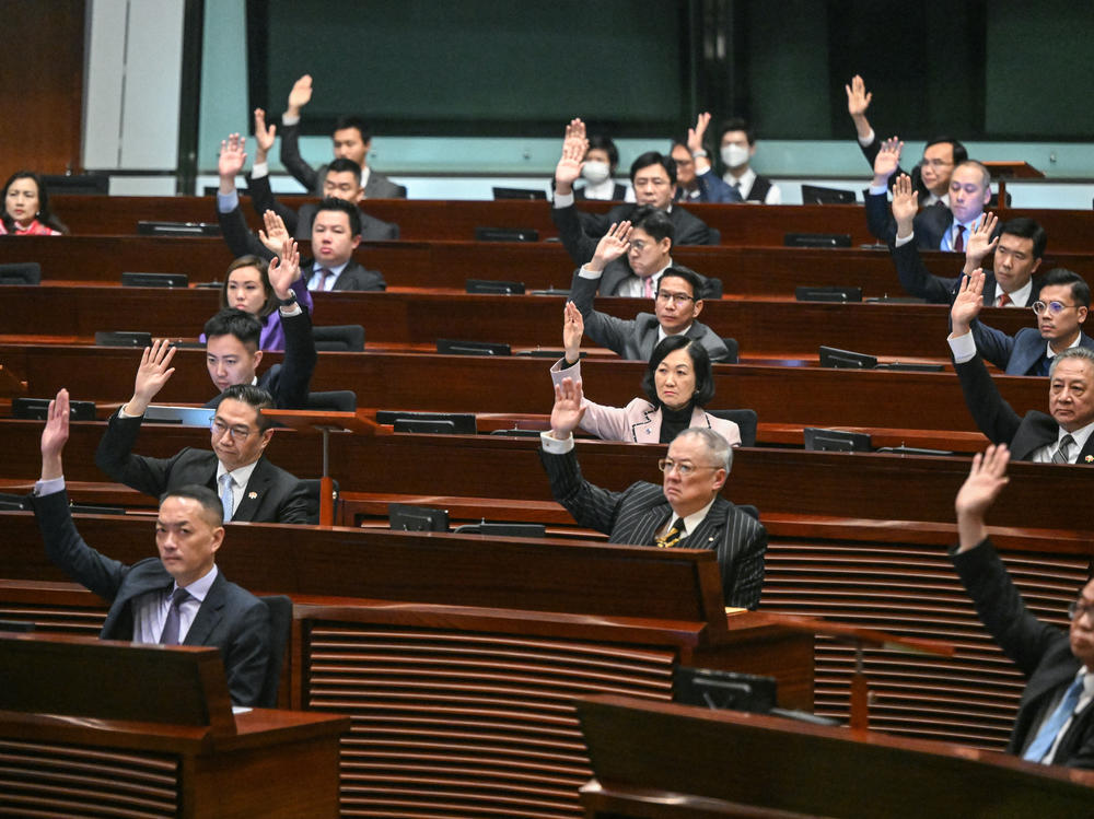 Lawmakers vote for Article 23 legislation in Hong Kong on Tuesday.