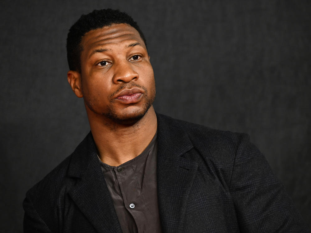 Actor Jonathan Majors attending the London premiere of his film <em>Creed III</em> in Feb. 2023, before his career imploded due to a series of abuse allegations and a court conviction in New York.