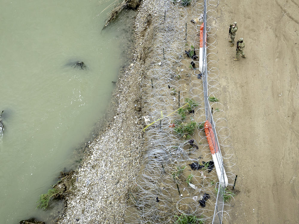 Texas National Guard soldiers are seen guarding the U.S.-Mexico border in Eagle Pass, Texas.