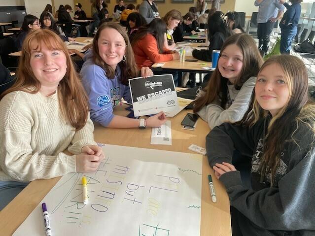 Some of the members of the team that won the escape room challenge at MisInfo Day, who represent Sedro Woolley High School, north of Seattle.