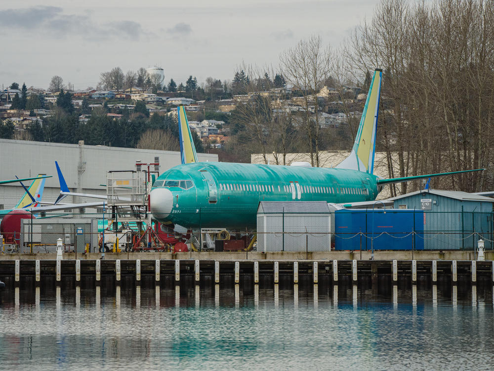 Boeing is under heightened scrutiny from regulators and the public after a door plug panel blew off a jet in midair two months ago. Now the Justice Department is conducting a criminal investigation. Several Boeing 737 Max planes under construction in Renton, Wash. are shown outside the company's plant on February 27, 2024.