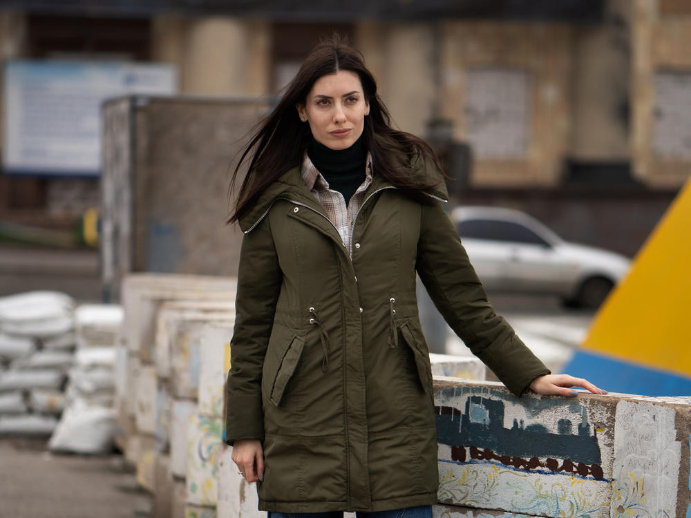 Maria Mezentseva, a member of Ukraine's parliament, stands outside Kharkiv's administrative building in the city center.