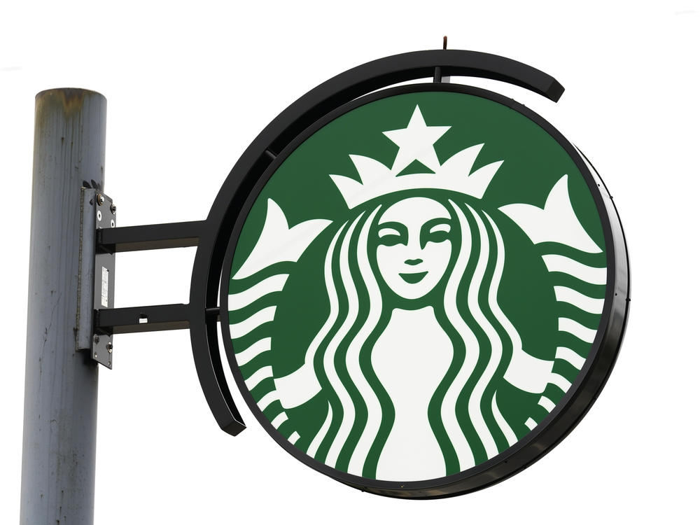 Nestlé says it is recalling nearly half a million Starbucks mugs that were sold recently after at least a dozen people suffered injuries including burns or cuts while using the product. Shown here is a Starbucks location in Havertown, Pa.