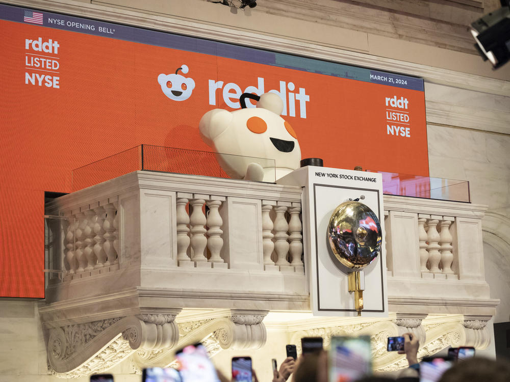 Reddit mascot Snoo rings the New York Stock Exchange opening bell, prior to the company's IPO, Thursday, March. 21, 2024.