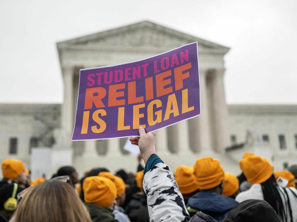 Activists and students protest in front of the Supreme Court during a rally for student debt cancellation in Washington, D.C., in February 2023.