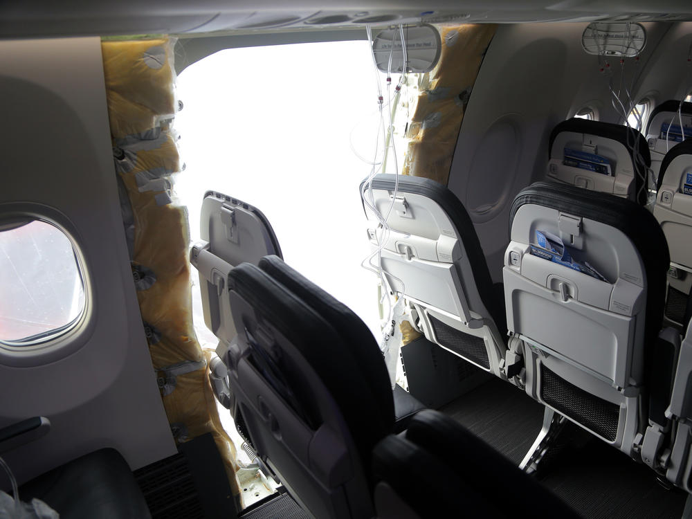 This National Transportation Safety Board photo shows an opening in the fuselage of Alaska Airlines Flight 1282. The door plug blew off the Boeing 737 Max 9 on January 5, 2024 as it climbed through 14,000 feet.