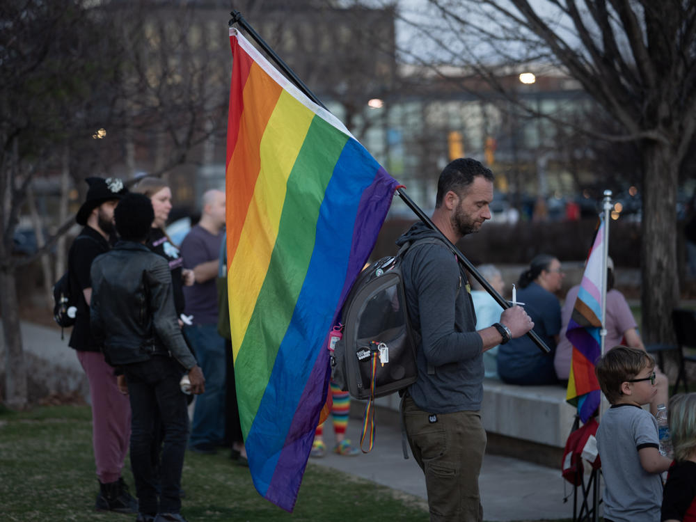 People attend a candlelight vigil for 16-year-old nonbinary student Nex Benedict on February 25, 2024 in Tulsa, Oklahoma. Benedict died one day after a physical altercation in an Owasso High School girls' bathroom.