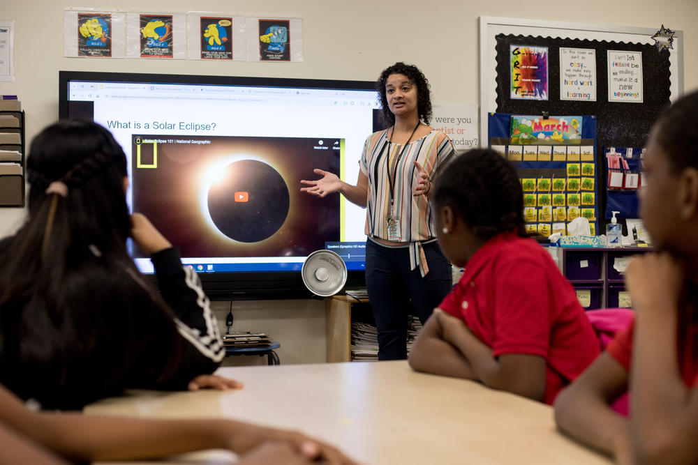 Natasha Cummings also led her fifth graders through a solar eclipse lesson. The older kids' eclipse simulation incorporated measurements.