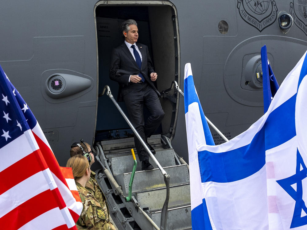U.S. Secretary of State Antony Blinken arrives in Tel Aviv, Israel, on Friday.