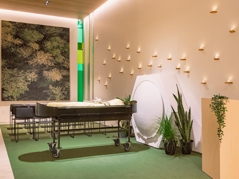 The Gathering Space is a room at Recompose where families can hold services and rituals for their loved ones. In this photo, a demonstration mannequin stands in for the body.