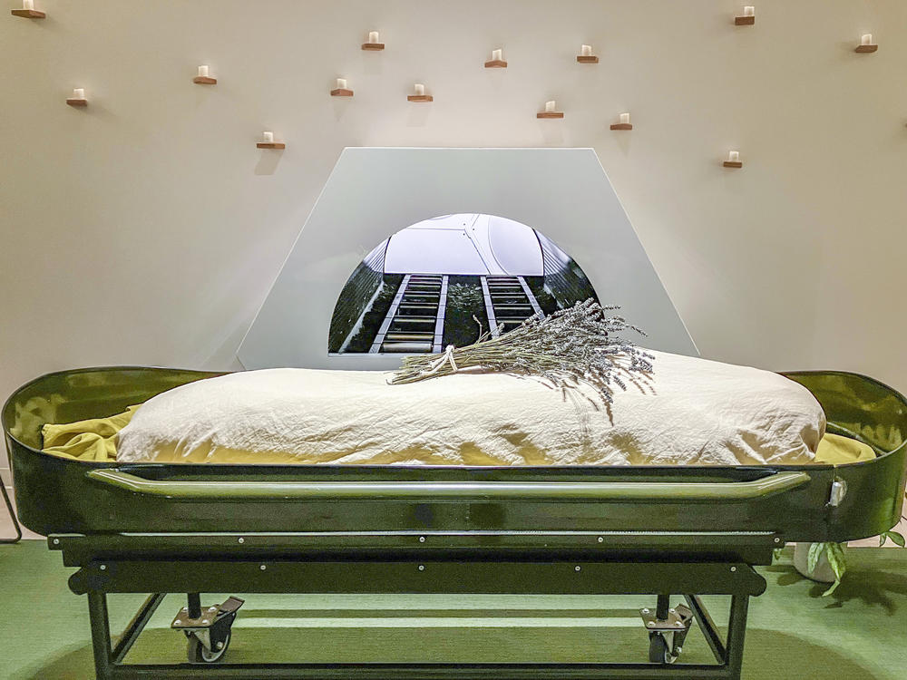 At Recompose in Seattle, families can hold a funeral ceremony known as a laying-in before the body is prepared for human composting. In this photo, a demonstration mannequin stands in for the body. Afterwards, the body is moved into a composting vessel in the adjacent building and surrounded with wood chips, alfalfa, and straw to start the 30-40 day process.