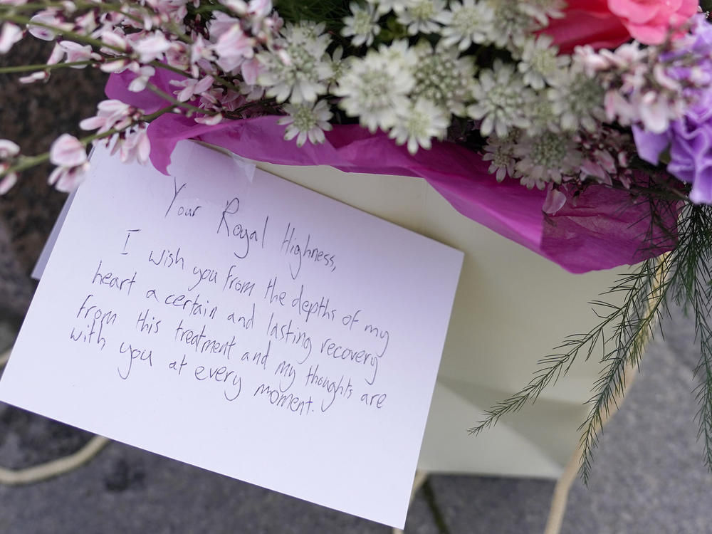 Flowers and a letter to the Princess of Wales were left outside Windsor Castle on Saturday.