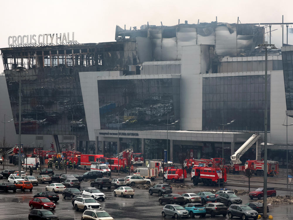 Members of emergency services work at the scene of the gun attack at the Crocus City Hall concert hall in Krasnogorsk, outside Moscow, on Saturday.