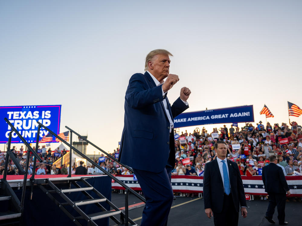 Former President Donald Trump dances after speaking at a rally at the Waco Regional Airport last March in Waco, Texas.