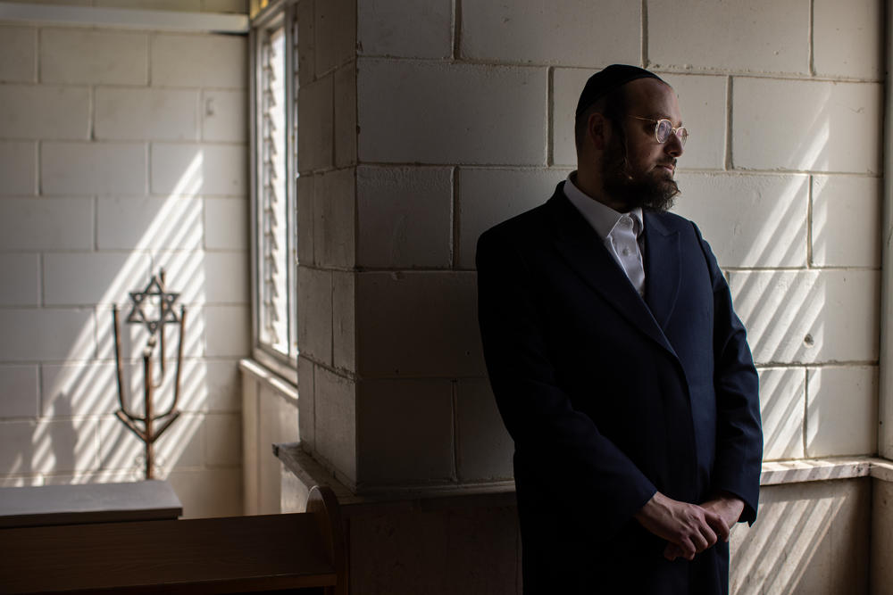 Rabbi Yonatan Reiss, who co-founded Yeshiva Chedvata, stands for a portrait in the study hall at the yeshiva in Gan Yavne, Israel, on March 20. The school aims to be a bridge between the ultra-Orthodox and secular military culture.