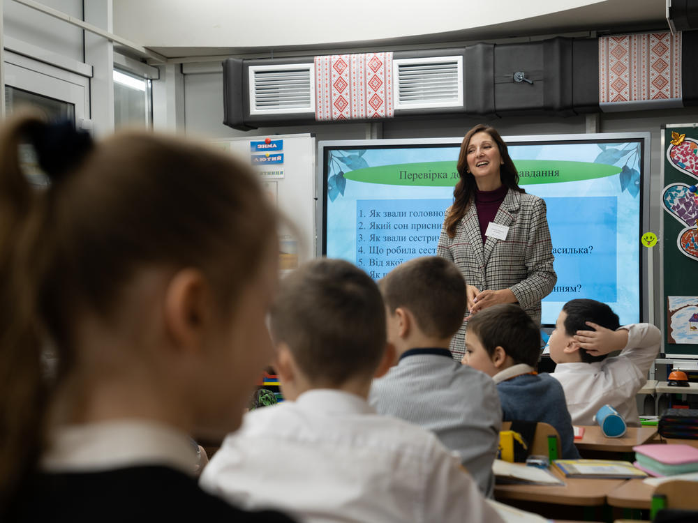 Liudmyla Demchenko teaches in the classroom at the underground school in Kharkiv.