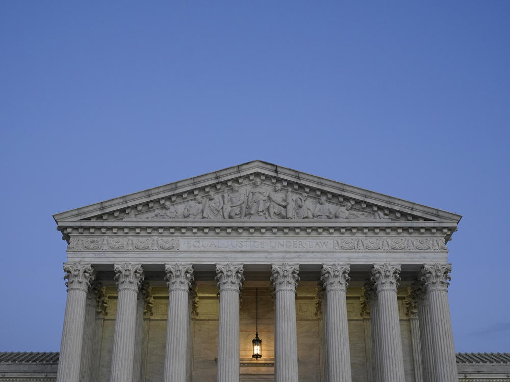 Light illuminates part of the Supreme Court building at dusk on Capitol Hill in Washington, D.C., on Nov. 16, 2022.