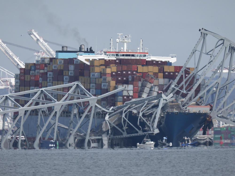 A collapsed section of the Francis Scott Key Bridge in Baltimore is seen in the waters of the Patapsco River. The bridge collapsed early Tuesday after it was struck by a<strong> </strong>984-foot-long cargo ship.