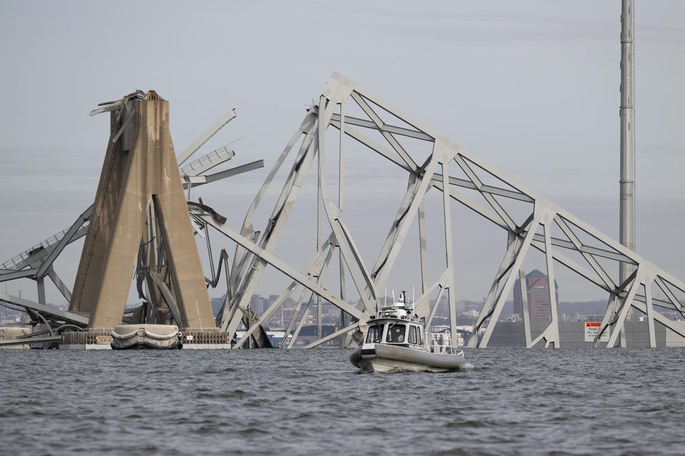 A view of the collapsed Francis Scott Key Bridge after a collision with the Dali, a container ship. in Baltimore, Md.