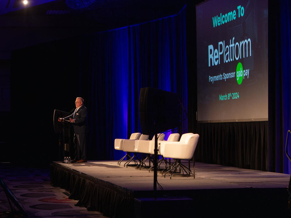 Chris Widener, founder of the Red Referral Network, speaks at the RePlatform conference.