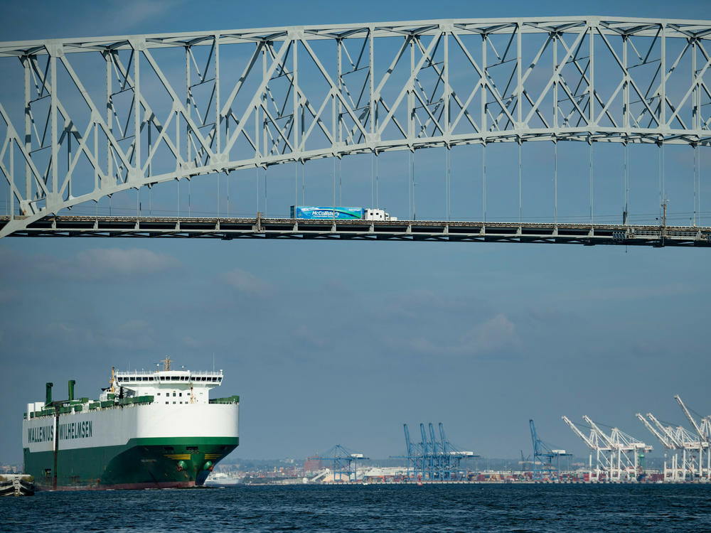 A cargo ship passes below the Francis Scott Key Bridge in 2021.
