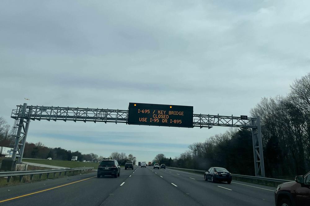A sign warns drivers heading to Baltimore that the Francis Scott Key bridge is closed and to use alternate routes.