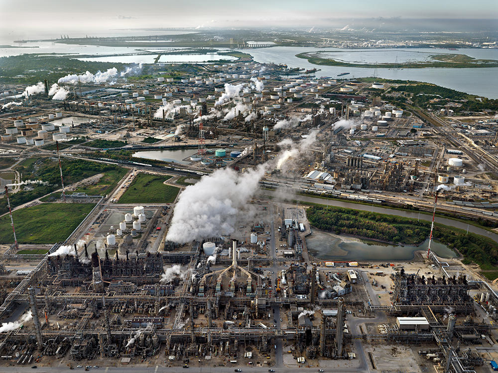 A 3,400-acre Exxon Petrochemical plant in Baytown, Texas, produces materials for tires, car bumpers and over 500,000 barrels of crude oil per day, according to <a href=