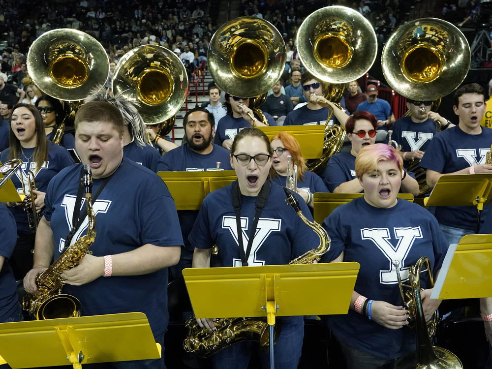 The University of Idaho Marching Band, wearing Yale T-shirts, performs at the NCAA Tournament game between Yale and San Diego State in Spokane, Wash., on Sunday. The band has been honored in Connecticut for filling in as Bulldogs.