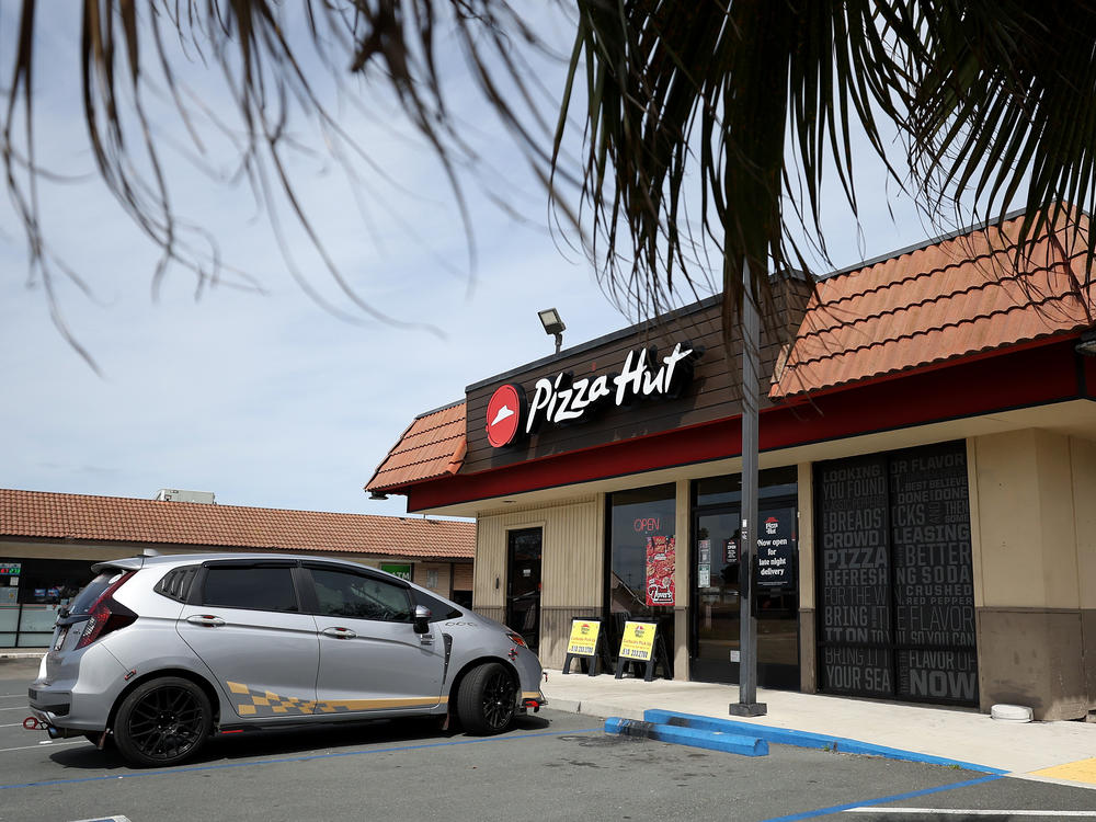 One big Pizza Hut franchisee in California cited the upcoming wage hike as a reason for laying off more than 1,000 delivery drivers in a shift to delivery apps like Uber Eats and DoorDash.