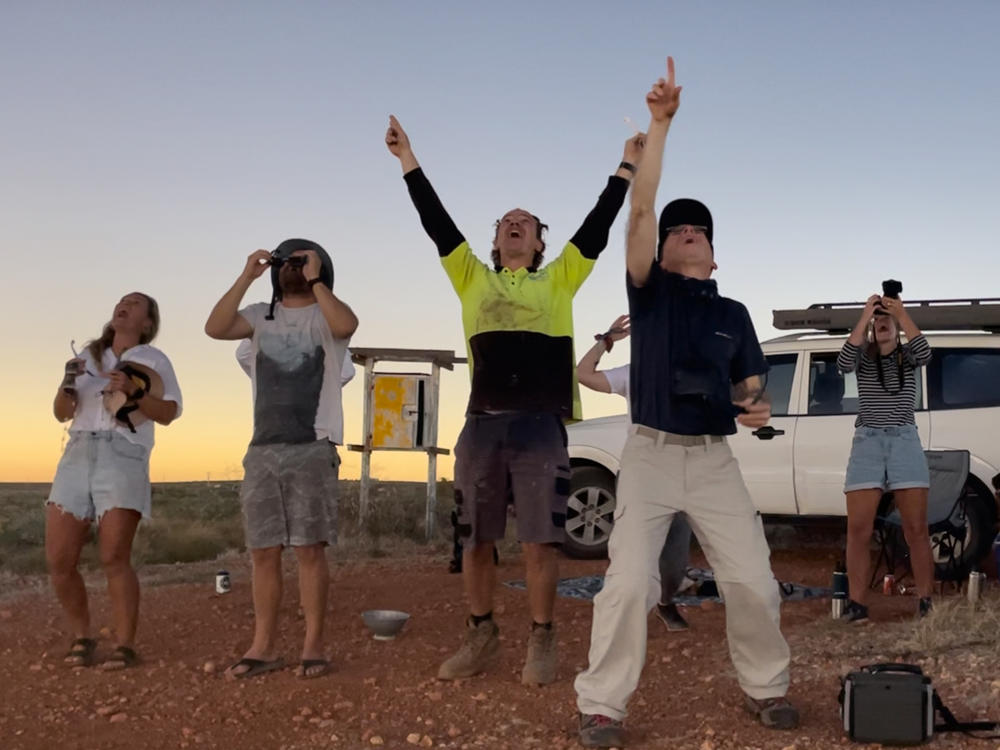 Science writer David Baron views the beginning of a solar eclipse with friends in Western Australia in 2023. Baron says getting to see the solar corona during a total eclipse is 