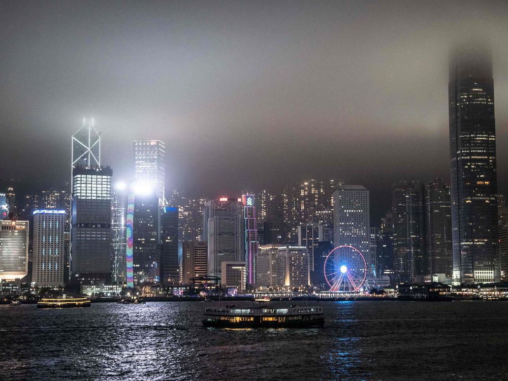 A view of the Hong Kong skyline is pictured before the lights were turned off to mark the Earth Hour environmental campaign on March 25, 2023.