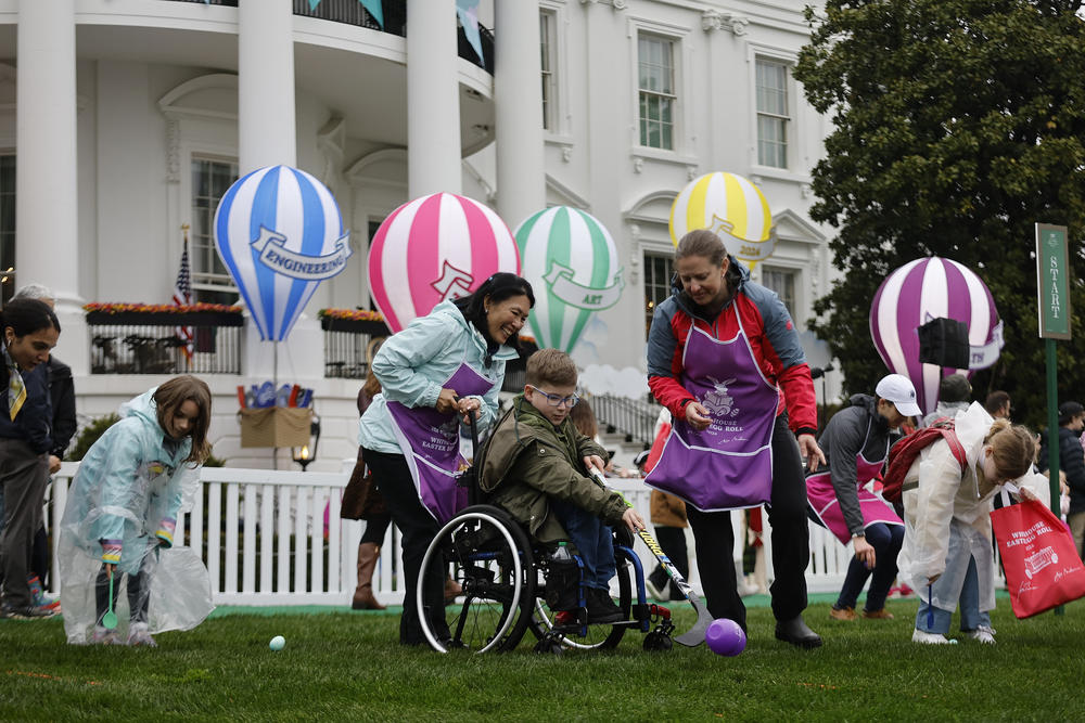 Children participate in the White House Easter Egg Roll.