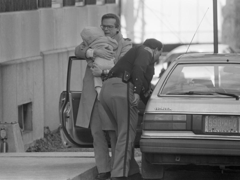 William Stern holds his daughter, known as Baby M. The notorious 1986 case led to many states passing laws limiting surrogacy. A Michigan lawyer named Noel Keane wrote the surrogacy contract for the Sterns.
