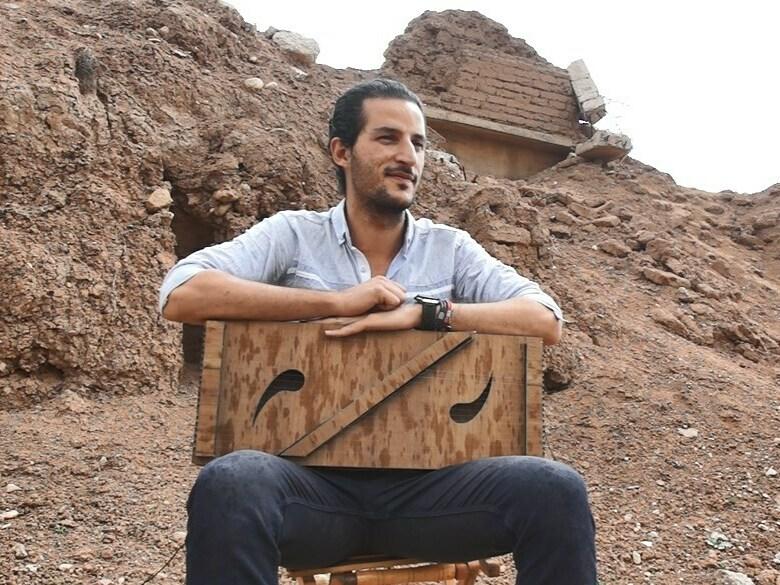 Mokdad with the instrument he invented, named 
