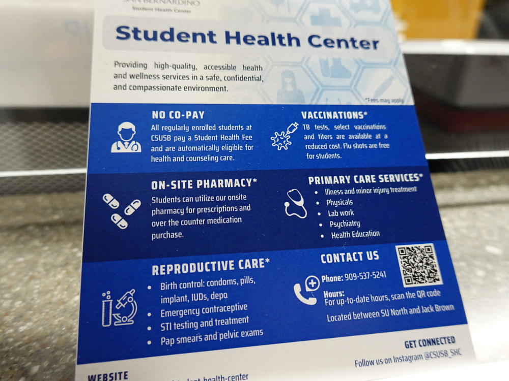 A card given to students at California State University-San Bernardino's Student Health Center does not list medication abortion as a service even though the center does provide it.