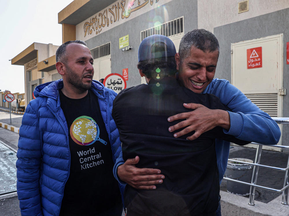 Relatives and friends mourn the death of Saifeddin Issam Ayad Abutaha, a member of the U.S.-based aid group World Central Kitchen who was killed as Israeli strikes hit its convoy delivering food in Gaza, during his funeral in Rafah, in the southern Gaza Strip, on Tuesday.