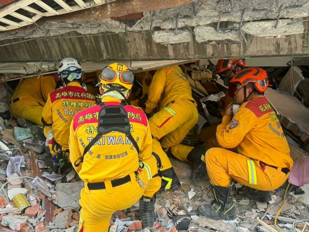 Hualien: Kaohsiung Fire Department staff search inside a building for rescue operation.