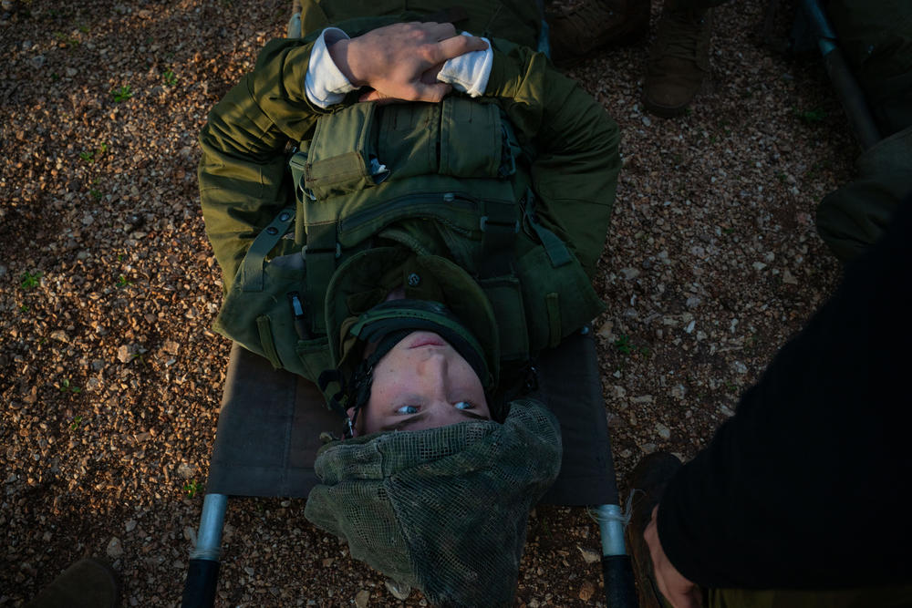 Israeli soldiers practice evacuating wounded people with a helicopter during a military drill in northern Israel on Feb. 20, in an effort to prepare for a potential escalation in the conflict between Israel and Hezbollah in Lebanon.