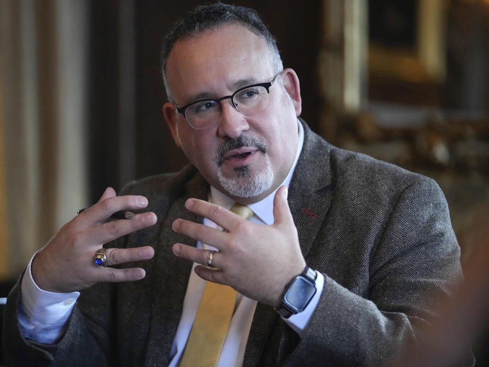 U.S. Education Secretary Miguel Cardona participates in an event at Dartmouth College in January.