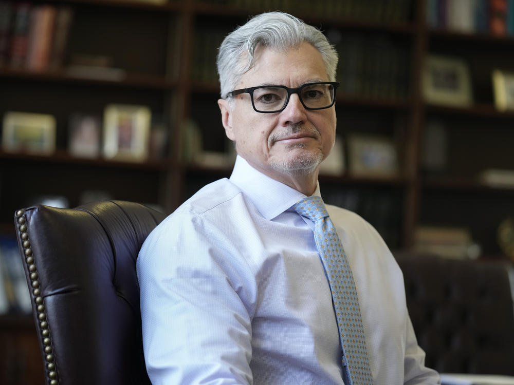 Judge Juan M. Merchan poses in his chambers in New York on March 14, 2024.