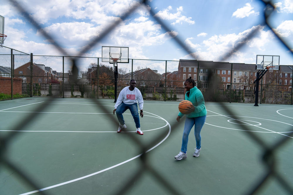 Joseph Yousef plays basketball with his daughter, Jakayla Morton, 11, in Alexandria, VA., on March 29.