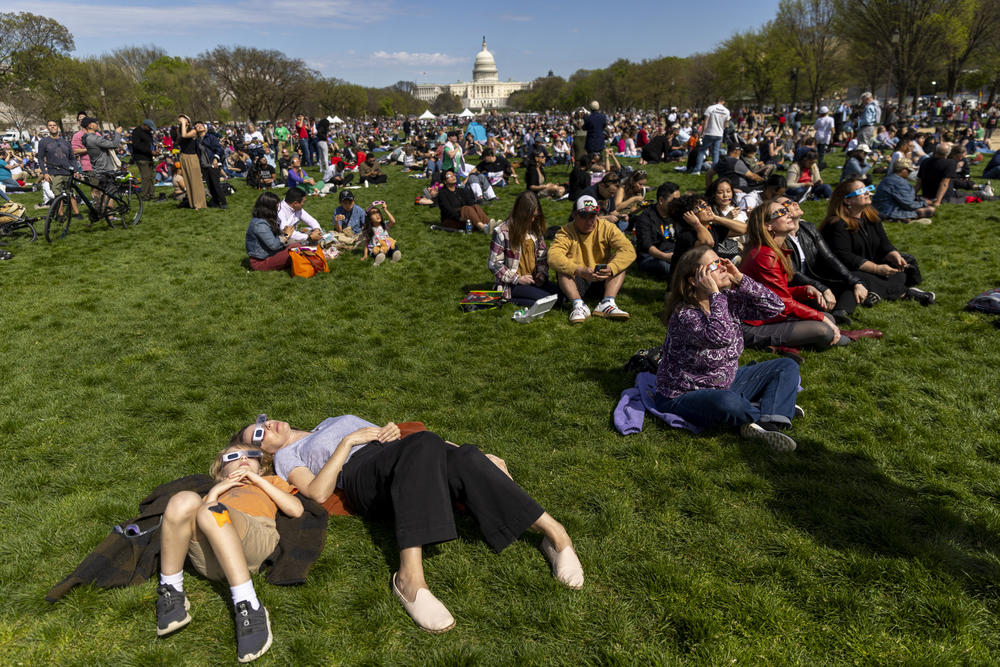 Thousands of people came to the National Mall in order to see the partial eclipse of the sun and to enjoy the Solar Eclipse Festival.