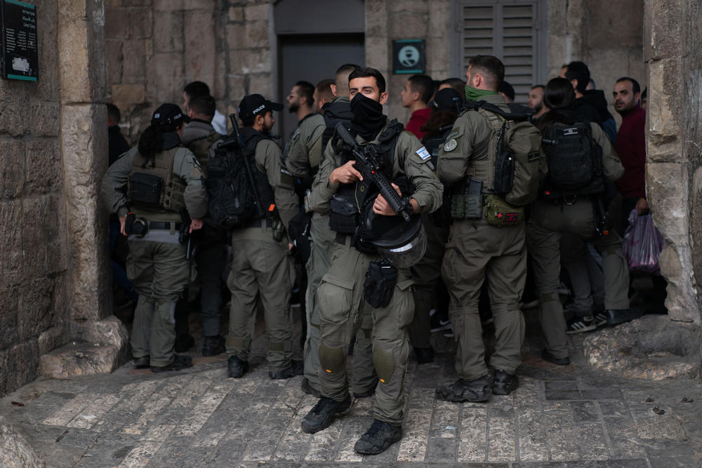 Israeli border policemen gather as Muslim worshipers arrive to the Old City of Jerusalem for Friday prayers at Al-Aqsa Mosque on March 15.